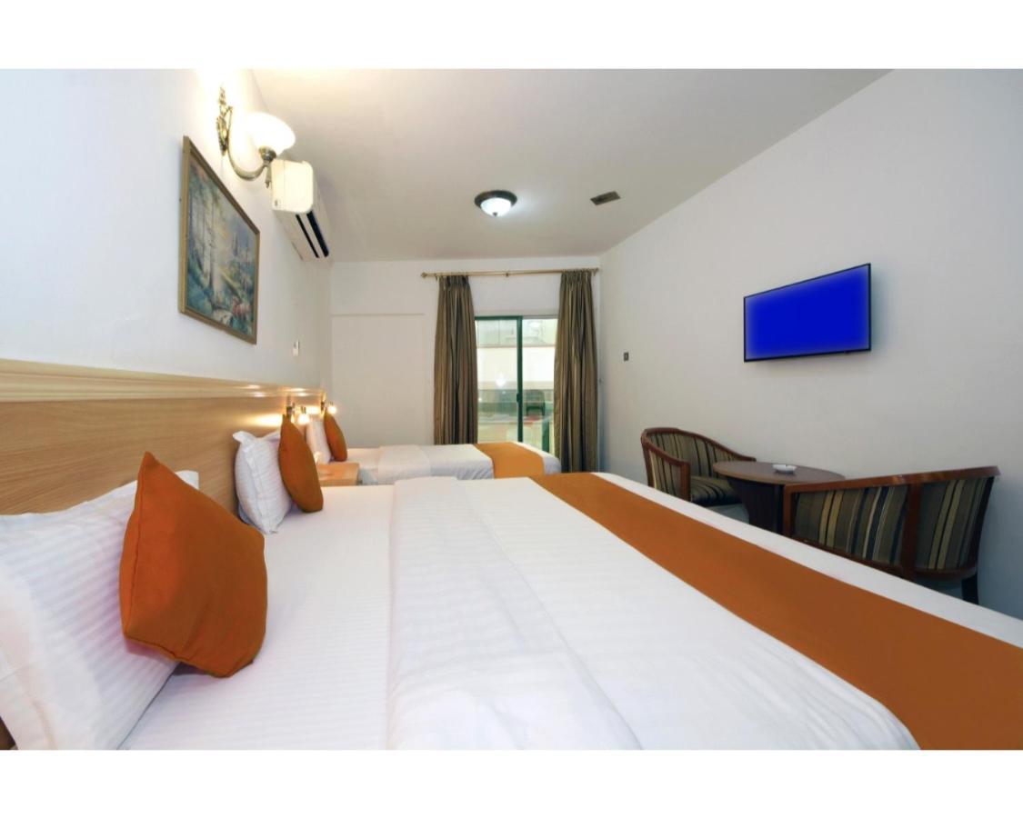 Dallas Hotel Дубай Екстериор снимка